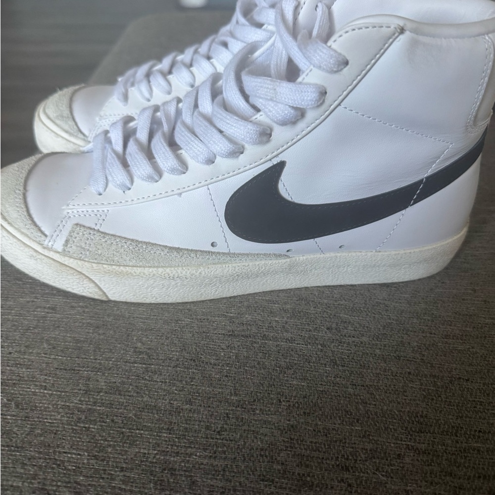 Nike White High-Top Sneakers with Black Swoosh Accent